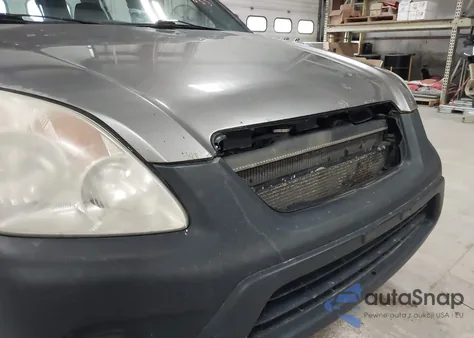 2006 Honda Cr-V Lx z USA, uszkodzony, nr VIN JHLRD785X6C053853